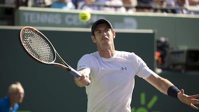 Andy Murray, of Great Britain, returns the ball to Kevin Anderson, of South Africa, during their match at the Miami Open tennis tournament in Key Biscayne, Fla., Tuesday, March 31, 2015. (AP Photo/J Pat Carter)