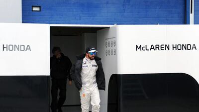McLaren's Fernando Alonso steps out of the team paddock during F1 winter testing on Tuesday in Jerez. Cristina Quicler / AFP