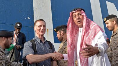 Foreign Ministry director general Mazen Al Hamli welcomes evacuees. AFP