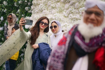 People celebrate during the Eid in the Square festival in Trafalgar Square. PA