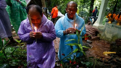 Forecasters said light rain would continue to fall on Wednesday. Sakchai Lalit / AP Photo