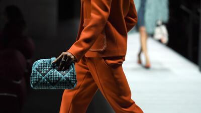A model walks the runway during the Bottega Veneta Fall/Winter 2018 fashion show at the American Stock Exchange on February 9, 2018 AFP