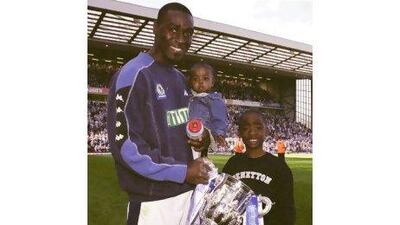 Andrew Cole with Devante, right, and daughter Faith, after winning Worthington Cup in 2002.