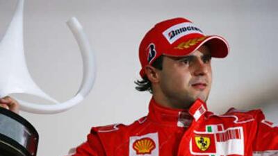 Felipe Massa of Ferrari struggles to hide his disappointment of losing out on the world title to McLaren's Lewis Hamilton, despite winning the Brazilian GP in front of his home crowd.
