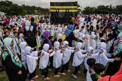 Malaysian children during an educational simulation of the Hajj pilgrimage outside Kuala Lumpur in 2017. South-East Asia's 250 million Muslims are chiefly concentrated in Indonesia and Malaysia: two countries with a reputation for moderation and pluralism. AFP