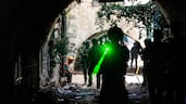 Israeli soldiers pass through a market in the Old City of Nablus, in the occupied West Bank. AFP