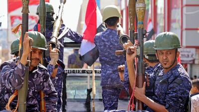 Yemeni security forces take part in a military parade in the city of Taiz. AFP
