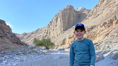 Finlay hiked through wadis and on the edges of mangroves, used ropes to ascend mountains and walked through deserted villages in the UAE to raise money for underprivileged children.