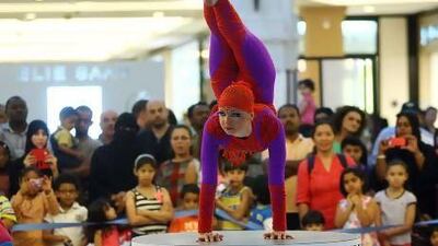 An acrobat from Xtreme Festival international circus performing yesterday at Mall of the Emirates in Dubai, as part of the celebrations during the Dubai Summer Surprises shopping festival. Satish Kumar / The National