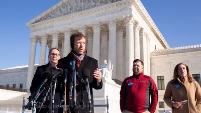 Brandon Trosclair, owner of a chain of grocery stores and plaintiff in a case before the Supreme Court challenging the US Department of Labour's Occupational Safety and Health Administration (OSHA) vaccine mandate, speaks outside the Supreme Court in Washington. EPA