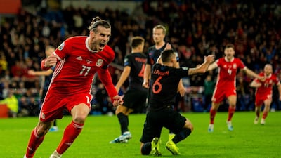 Gareth Bale celebrates scoring Wales' equaliser against Croatia at the Cardiff City Stadium. EPA