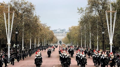 Queen Elizabeth travels up the Mall enroute to Buckingham Palace after delivering a speech at the State Opening of Parliament in 2006. Getty Images