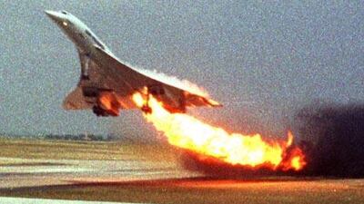 Air France Concorde flight 4590 takes off with fire trailing from its engine on the left wing from Charles de Gaulle airport in Paris, in this July 25, 2000 photo. The plane crashed shortly after take-off, killing all the 109 people aboard and four others on the ground.