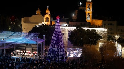 The large traditional Christmas tree in Manger Square. Bethlehem's Palestinians hope that tourist numbers will rise in the weeks before Christmas. EPA
