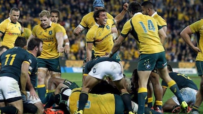 Australia scrum half Nick Phipps reacts after teammate Tevita Krudrani, unseen, scores the winning try on Friday against South Africa in the Rugby Championship. Jason Reed / Reuters / July 18, 2015