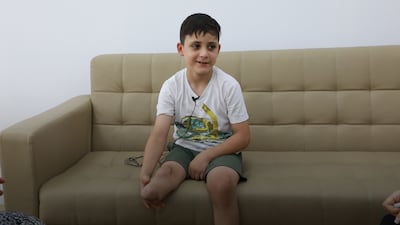 Siraj Magdi, 8, is receiving mental health support at Emirates Humanitarian City. Wajod Alkhamis / The National