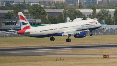 A British Airways flight comes into land at Heathrow Airport, London. PA
