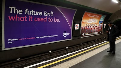 A British Telecom (BT) advertisement is displayed at an underground station in London. Reuters