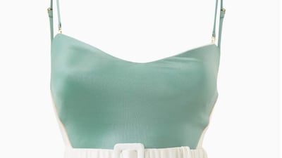 With its spaghetti straps and ruched belt, the Juan De Dios Tequila swimsuit ticks multiple style boxes and comes in a deliciously cool mint green; Dh1,020, Juan De Dios at ounass.ae. Photo: Ounass