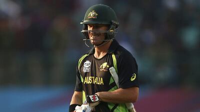 David Warner of Australia looks dejected after being dismissed by Mitchell Santner of New Zealand during the ICC World Twenty20 India 2016 Super 10s Group 2 match between Australia and New Zealand at HPCA Stadium on March 18, 2016 in Dharamsala, India. (Photo by Ryan Pierse/Getty Images