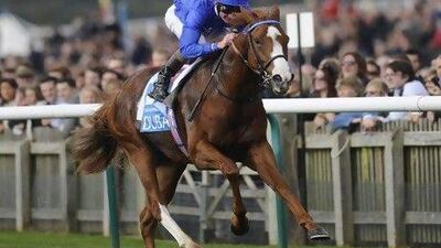 The jockey Kevin Manning rode to his fifth victory in seven years. Alan Crowhurst / Getty Images