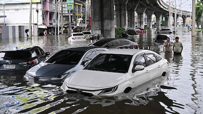 Cars were left abandoned and many homes were inundated. AFP