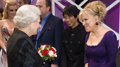 Queen Elizabeth meets US actress and singer Bette Midler. Getty