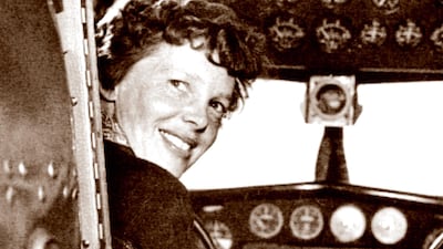 A May 20, 1937 photo shows US aviator Amelia Earhart at the controls of her Lockheed 10 Electra. Albert Bresnik / The Paragon Agency / AFP)