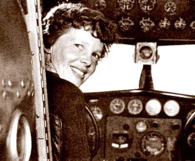A May 20, 1937 photo shows US aviator Amelia Earhart at the controls of her Lockheed 10 Electra. Albert Bresnik / The Paragon Agency / AFP)