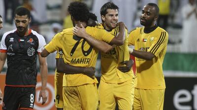 Al Wasl, in yellow, were ecstatic to beat Ajman in the President’s Cup on Monday night, but there is plenty of room for improvement. Razan Alzayani / The National