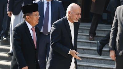 Afghanistan President Ashraf Ghani, right, and Indonesian vice president H. Muhammad Jusuf Kalla walk out after the opening ceremony of the Kabul Process Conference on February 28, 2018. Jawad Jalali /EPA Photo