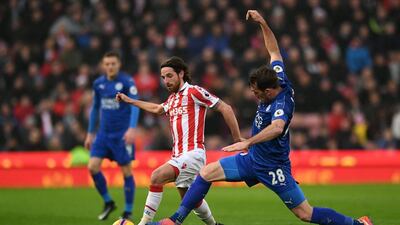Leicester City’s Christian Fuchs in action with Stoke City’s Joe Allen. Anthony Devlin / Reuters