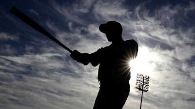 Texas Rangers' Elvis Andrus poses for a photographer during the team's photo day at spring training baseball practice. AP