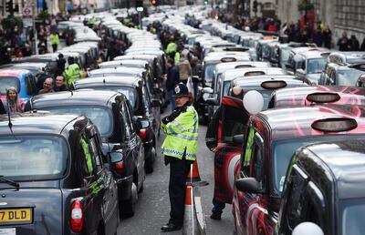 London black cab taxis have protested against Uber. EPA
