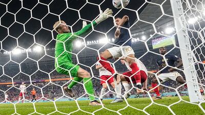Kylian Mbappe scores for France against Denmark at the 2022 World Cup in Qatar. AP
