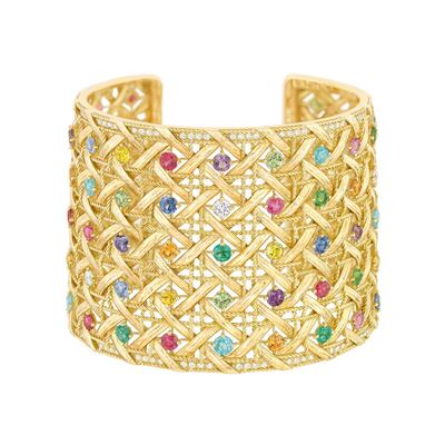 A woven yellow gold My Dior cuff, with diamonds and coloured gemstones, has an estimate of £30,000-£50,000. Courtesy Sotheby's