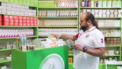Sabri Al Majanini sells soap at the fair. Reem Mohammed / The National