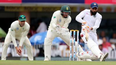 India's Ravindra Jadeja, right, plays a shot. AP