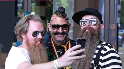 People take part in the international World Beard and Moustache Championships in Antwerp, Belgium. Reuters