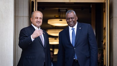 US Secretary of Defence Lloyd Austin, right, hosts Iraqi Minister of Defence Thabet Al Abbasi at the Pentagon in Arlington, Virginia. EPA