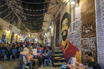 A mural of star footballer Mohamed Salah is painted on an alleyway in downtown Cairo. Egypt will play in the World Cup for the first time in 28 years on Friday. (Dana Smillie for The National)