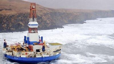 Last week, Shell's drill-ship Kulluk broke loose from its tug boats and grounded on an island south of Alaska. US Coast Guard / AP Photo