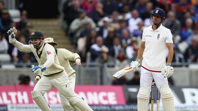 Alastair Cook looks dejected after being caught by Adam Voges. Ryan Pierse /G etty Images