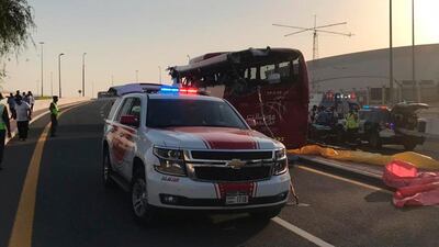 The aftermath of a bus crash in Dubai in which 17 passengers died. Dubai Police / AP