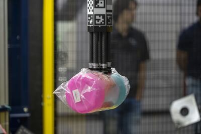 Amazon Sparrow while handling a product. Bloomberg