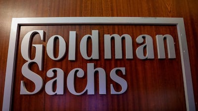 The Goldman Sachs company logo on the company's space on the New York Stock Exchange. Junior analysts have complained about working conditions at the bank, which made a net profit of $9.46bn last year. Reuters.