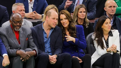 From left, former Celtics player and coach Tom 'Satch' Sanders; Britain's Prince William and his wife Kate; and Emilia Fazzalari, wife of Celtics owner Wyc Grousbeck watch an NBA basketball game between the Boston Celtics and the Miami Heat