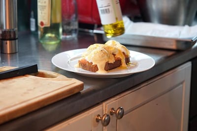 Poached eggs and salmon with chef Izu Ani's signature hollandaise sauce. Courtesy Izu Ani