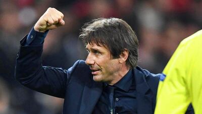 Italy manager Antonio Conte celebrates after his team's Euro 2016 win over Belgium on Monday. Daniel Dal Zennaro / EPA / June 13, 2016
