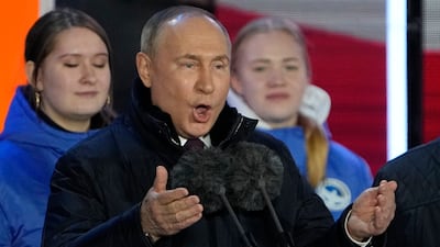 Vladimir Putin speaks at a concert marking his latest presidential election victory and the 10th anniversary of the annexation of Crimea. AP